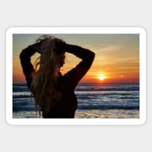 Beautiful woman on the beach at sunrise Sticker